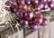 Bunch of grapes on a wooden box