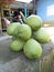 Bunch of green cococnut fruits