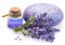 Bunch of lavandula, lavender essential oil and soap on white background