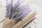 Bunch of lavender placed on book bundle