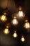 A Bunch Of Light Bulbs Hanging From A Ceiling. Generative AI