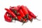 Bunch of long red chili peppers on a white background isolated. Vitamins, healthy food