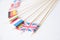 Bunch of miniature paper flags of several countries: UK,Germany,Sweden,Norway,Italy,France,Spain