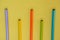 Bunch the multicolour wooden pencils isolated in yellow background