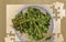 A bunch of nettles in a bowl. Nettle as an ingredient for soup making