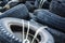 A bunch of old tires from used cars