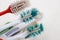 A bunch of old worn out toothbrushes