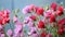 A bunch of pink and red flowers in a vase, spring flowers, sweet pea