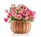 Bunch pink roses in wicker basket