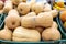 Bunch of pumpkins on the counter in supermarket