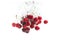 Bunch of red cherries splashing into crystal clear water with air bubbles. I