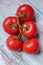 A bunch of red greenhouse tomatoes from Quebec