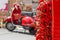 Bunch of red pepper in front of red scooter