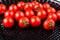 Bunch of red ripe tasty fresh cherry tomatos