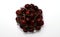A bunch of ripe cherries with peduncles lies on a white background. Large collection of fresh red cherries. Ripe cherries
