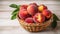 Bunch of ripe organic peaches in a wicker bowl, white wooden table background. Local produce fruits in a basket.