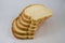 Bunch of slices of sandwich bread on white background