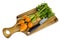 Bunch of small, round carrots (Parisian Heirloom Carrots) on wooden background