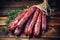 A bunch of smoked sausages in packaging on a wooden table. Appetizing homemade sausages. Wide selection of homemade farm meat