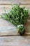 Bunch thyme on wooden boards