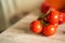 A bunch of tomatoes. Tomato Harvest. Grew up in a greenhouse. Fresh tomatoes, ready to pick. Close-up footage.