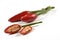 Bunch of two spicy red chillies and one cutted