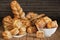 Bunch Of Various Sesame Cheese Puff Pastry And Croissant Set On Rustic Bamboo Place Mat