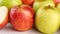 Bunch of wet apples on table