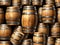 A Bunch Of Wooden Barrels Stacked On Top Of Each Other. Generative AI