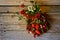 Bunches of dried medicinal herbs from viburnum, mountain ash, tansy, mint, lingonberries, wormwood and yarrow. Background for