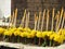 Bunches of marigold flowers with joss sticks and candles