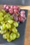 Bunches of white and red grapes