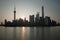 The Bund early in the morning at sunrise. Beautiful view of Pudong and Huangpu river from The Bund in Shanghai, China