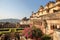 BUNDI, RAJASTHAN, INDIA - DECEMBER 08, 2017: Colorful gardens with the exterior facade of Chitrasala in Bundi Palace Garh