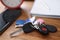 Bundle of car remote keys and keys from home and buzzer