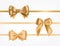 Bundle of golden satin ribbons decorated with bows.Collection of fancy decorative design elements. Set of festive gift