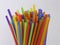 Bundle of Multi-colored Plastic Straws Sticking Up