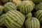 Bundle of Watermelons Closeup View Inside of a Grocery Store.