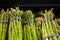 Bundles of asparagus or Asparagus officinalis on the shelves at the supermarket