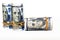 Bundles of money rolls of dollars  on white background, stack of one hundred dollars American cash money bills rolled up