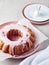 Bundt cake with pink cherry flowers