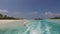 Bungalow huts in sea on tripical resort beach