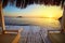 Bungalow on the sea at sunset. Wooden pavilions on the shore of a sandy beach - Bodrum, Turkey