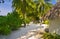 Bungalows on beach and sand pathway