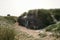 Bunker ruin at beach near Houvig, Jutland, Denmark, dune