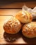 buns with sesame seeds on wooden background. AI generative