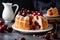 a bunt cake with cherries on a plate with a pitcher of tea in the background and a plate of cherries on the table