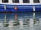 Buoy hanging over the board of a fishery ship