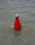 Buoy in middle of sea or river