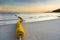 Buoyancy on the beach, sign warning dangerous